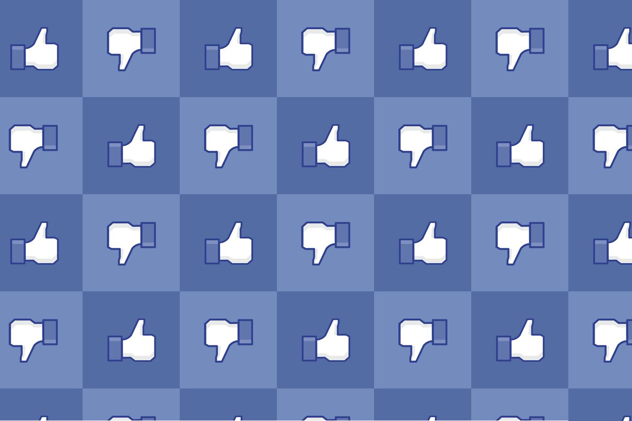 Ilustração com joinhas normais e invertidos do Facebook.