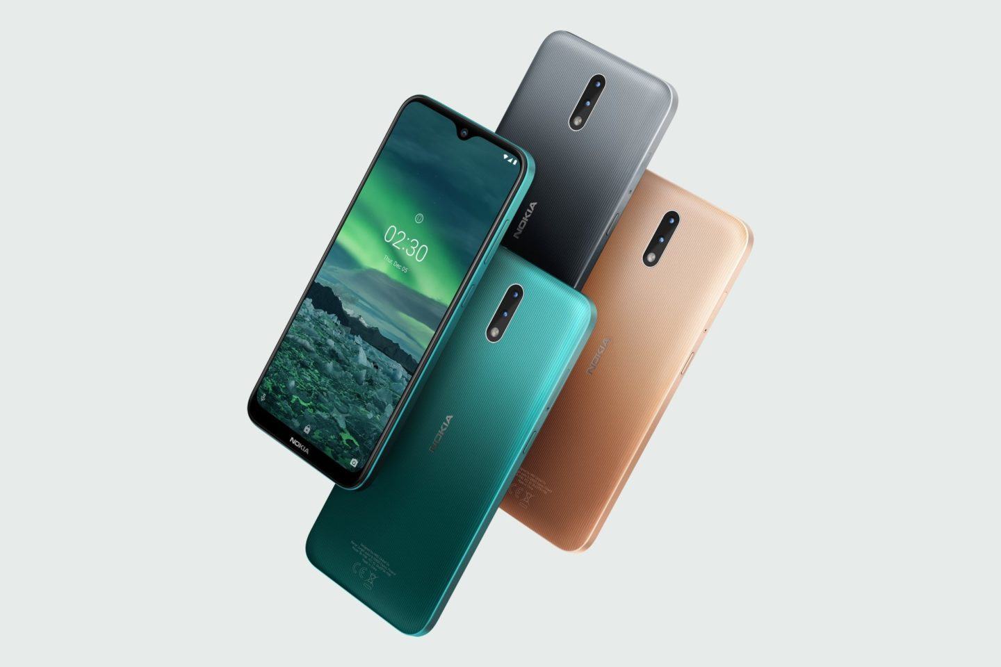 Quatro celulares Nokia 2.3 flutuando; três deles de costas mostrando as cores disponíveis do modelo.