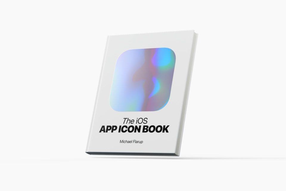 Livro fechado, com capa branca e um bloco brilhante grande na frente, com as formas dos ícones do iOS. Embaixo, o título: “The iOS App Icon Book”.