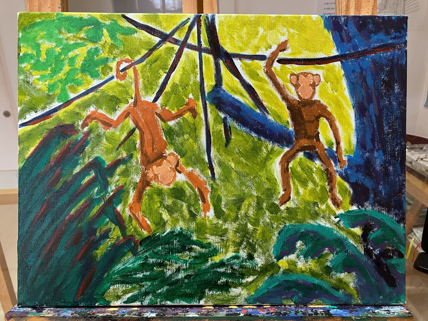 Segunda parcial do quadro dos macaquinhos, com tudo pintado, mas sem contornos nem detalhes.