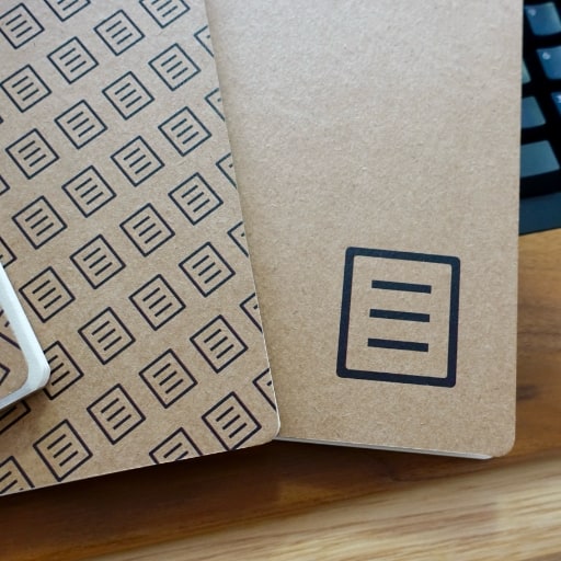 Capas (parciais) dos dois cadernos do Manual produzidos pela Unagi.