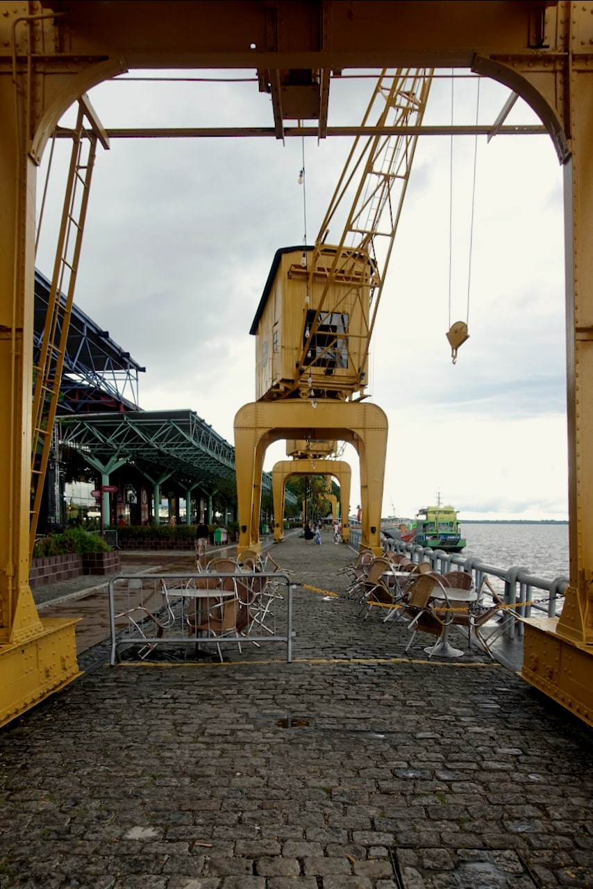 Yellow crane in the outdoor area of Estação das Docas, on the shore of Guajará Bay.